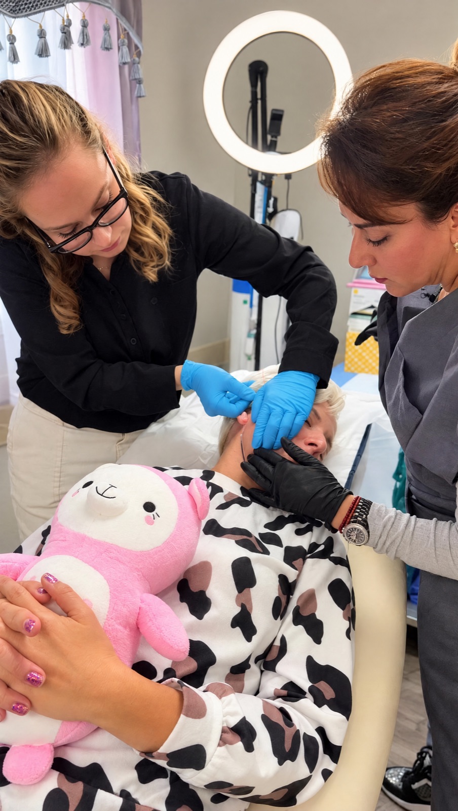 Naira leading a hands-on MINT PDO thread training session with a provider and a patient